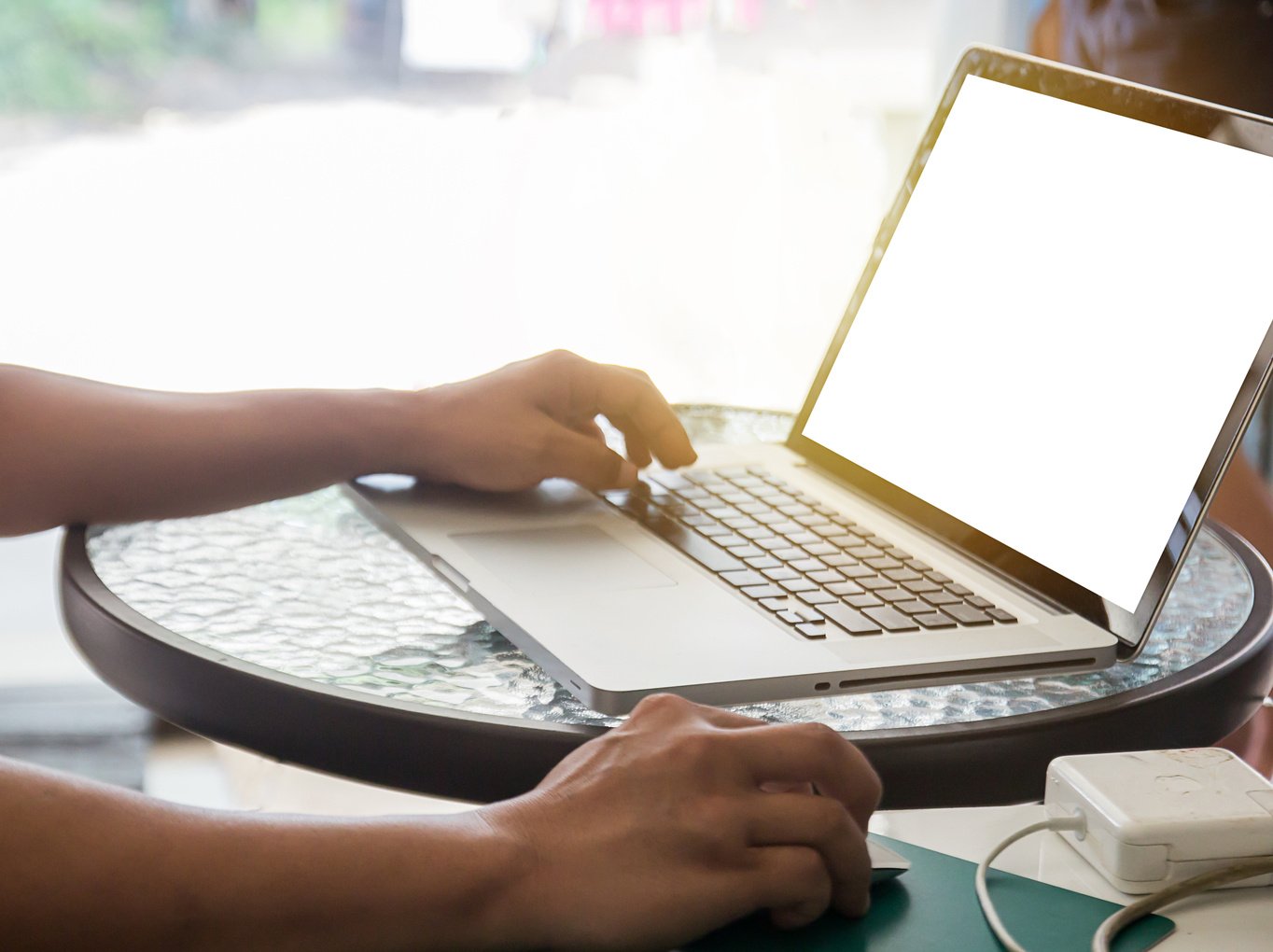 male hands working with a laptop